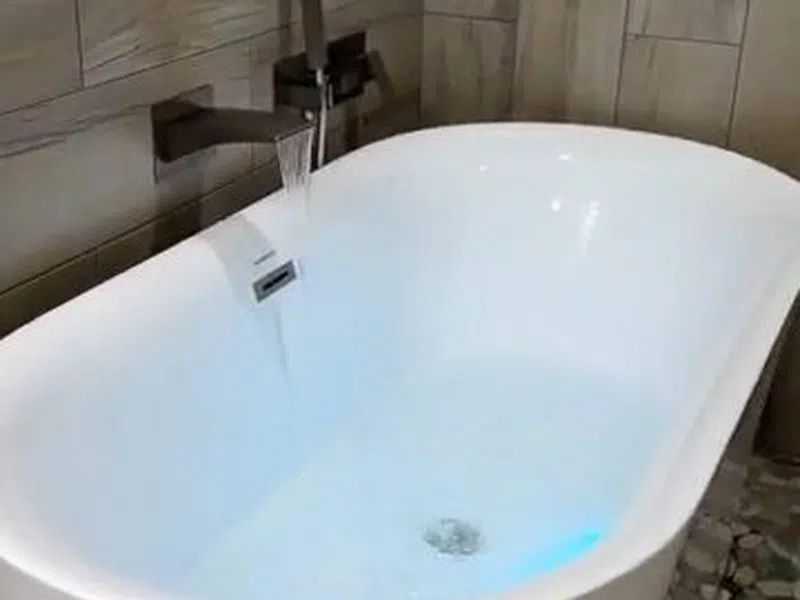 Bathroom shower or bathtub fixture area during installation or remodel work for Shower & Bathtub Installation in Goodyear showing bathroom shower bathtub fixture area installation remodel work body