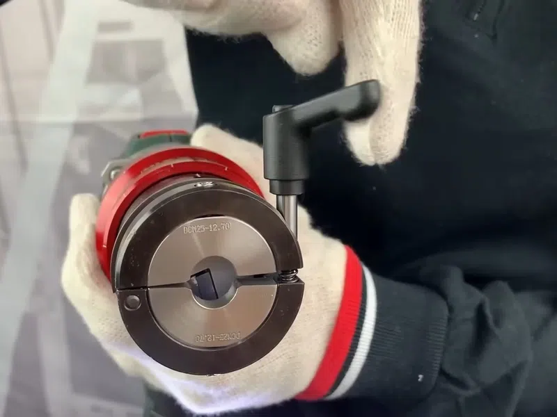 Close-up of a plumbing repair tool or fitting being used on pipe or fixture work for Why Your Goodyear RO System Is Slowing Down (And the Maintenance Schedule That Fixes