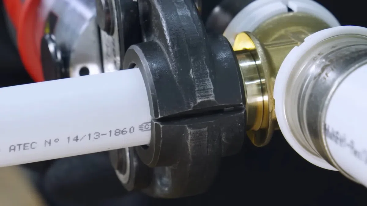 Close-up of a plumbing repair tool or fitting being used on pipe or fixture work for Plumbing Services in Waddell,