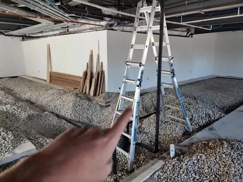 Commercial plumbing rough-in work inside an unfinished business space for Plumbing Services in Centerra, Goodyear