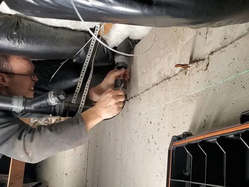 Exposed drain piping and cleanout access during plumbing rough-in work for Hydro Jetting in Goodyear