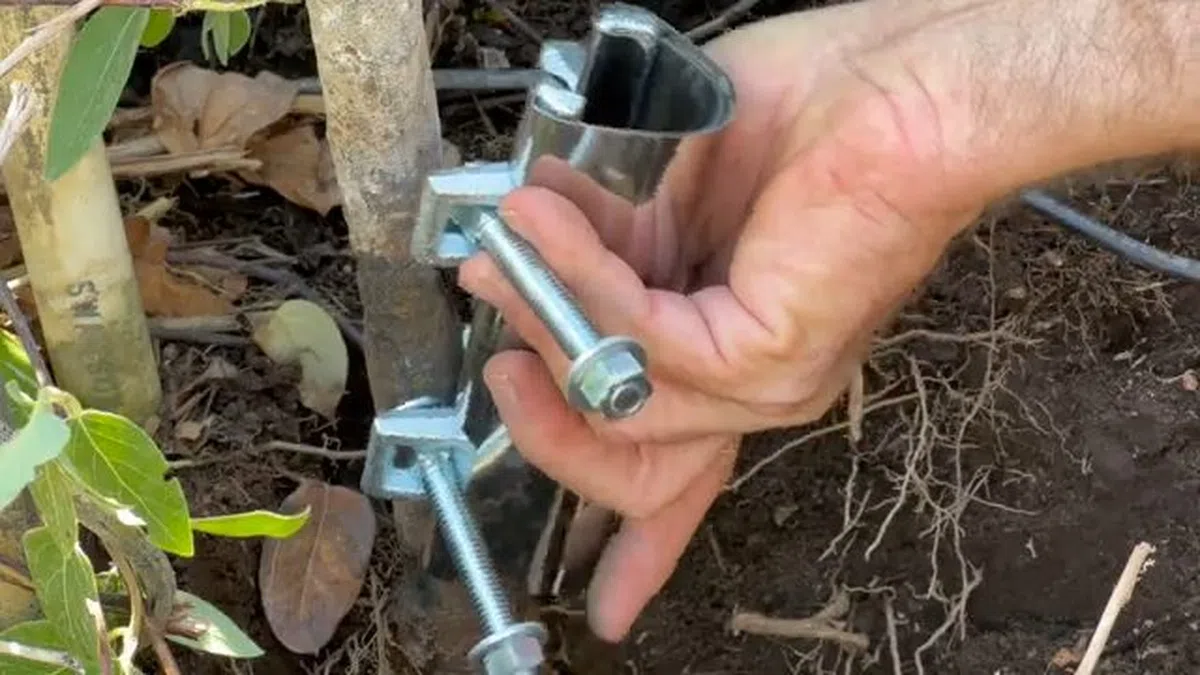 Exposed water line connection being repaired near an outdoor or utility access point for Plumbing Services in Litchfield Park,