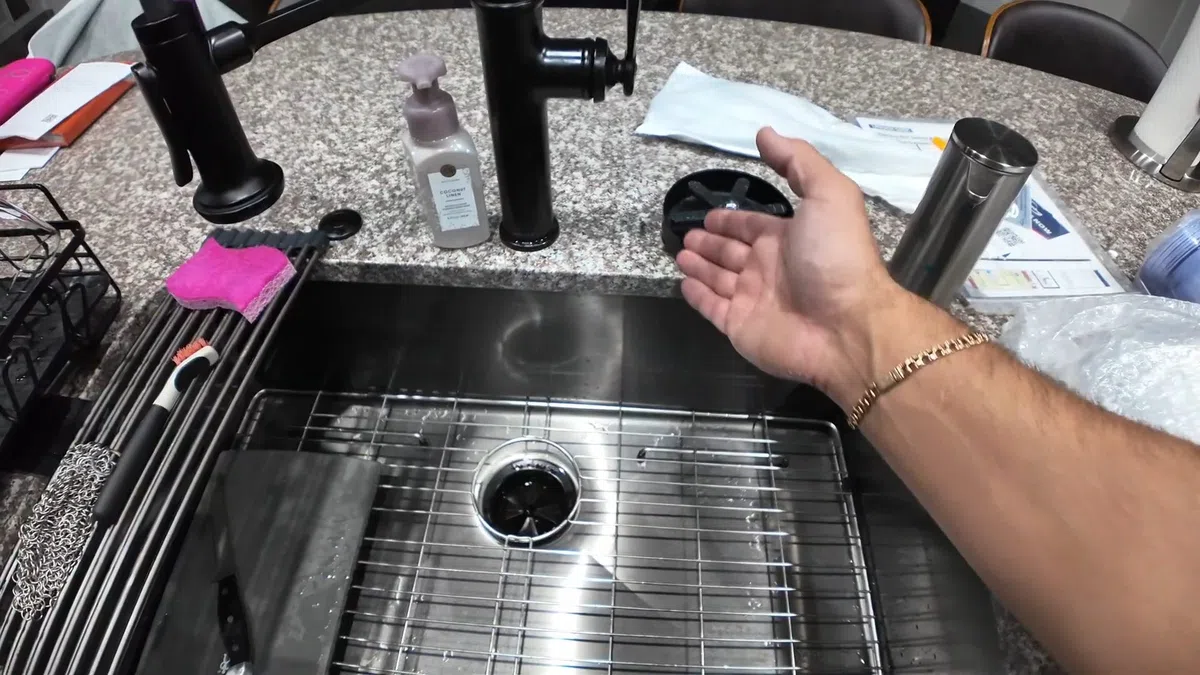 Sink faucet and drain connection being serviced below the fixture for Hose Bib & Outdoor Faucet Repair in Goodyear