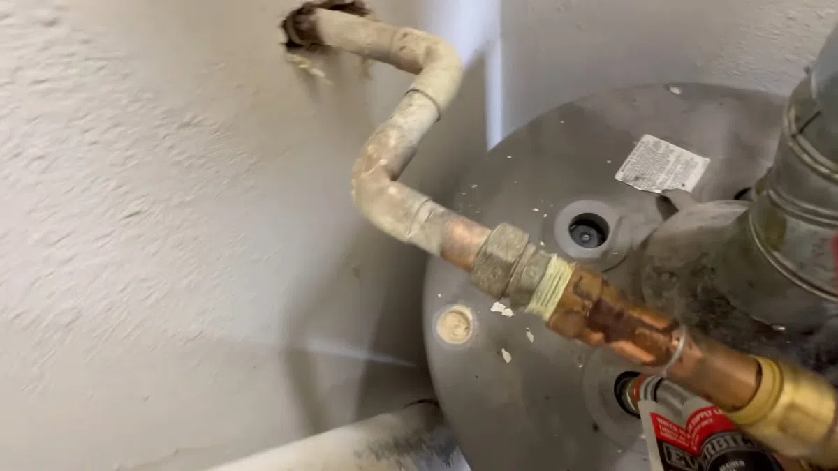 Tank water heater connections, valve fittings, and service components for 24/7 Emergency Plumber in Goodyear