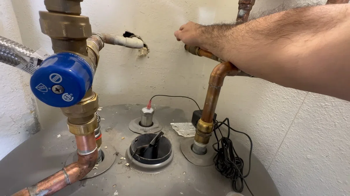 Tank water heater connections, valve fittings, and service components for Water Heater Repair in Goodyear