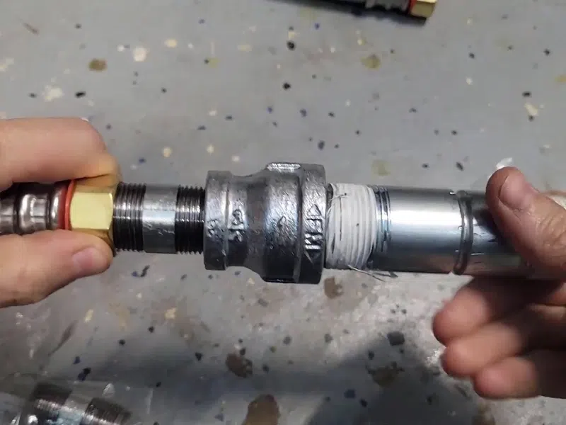Tank water heater connections, valve fittings, and service components for Plumbing Services in South Goodyear showing tank water heater connections valve fittings components south body detail
