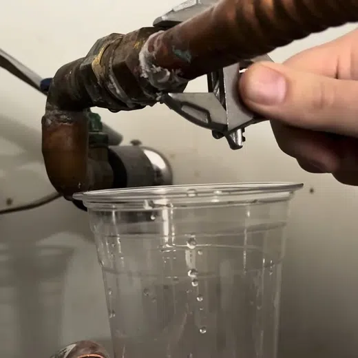 Tank water heater connections, valve fittings, and service components for Plumbing Services in Goodyear showing tank water heater connections valve fittings components thumbnail garage