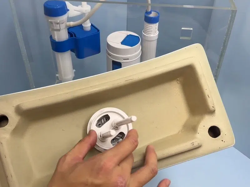 Toilet tank repair parts and fill valve components during a fixture service for Plumbing Services in Laveen,
