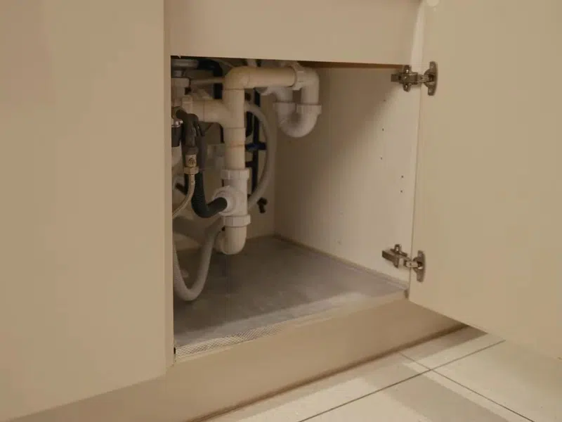 Under-sink reverse osmosis filter system connected below a kitchen sink for Pool Leak Detection & Repair in Goodyear