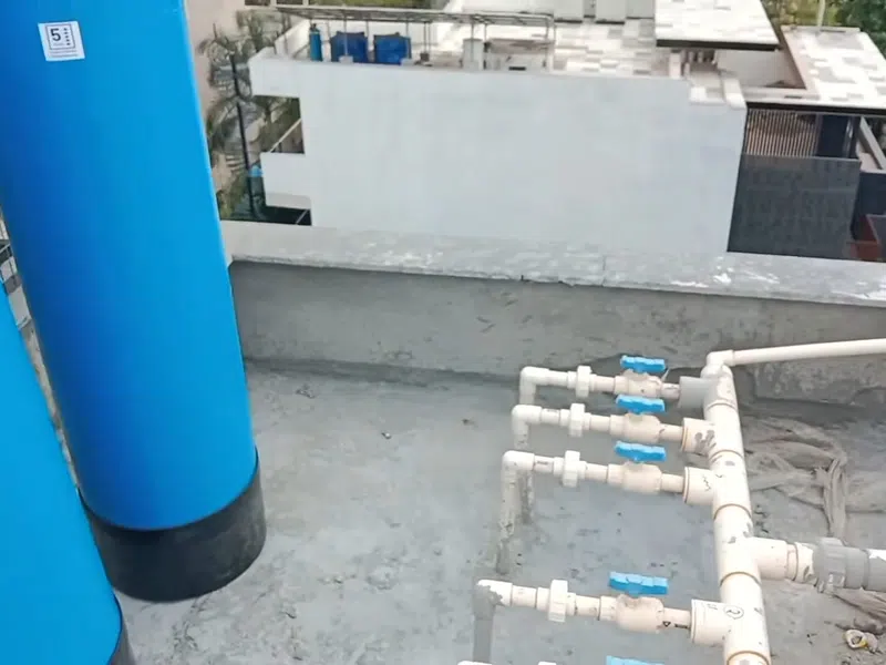 Whole-home water softener with control valve, brine tank, and plumbing connections for Plumbing Services Near the Goodyear Airport,