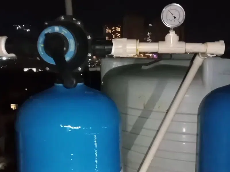 Whole-home water softener with control valve, brine tank, and plumbing connections for Plumbing Services in Centerra, Goodyear
