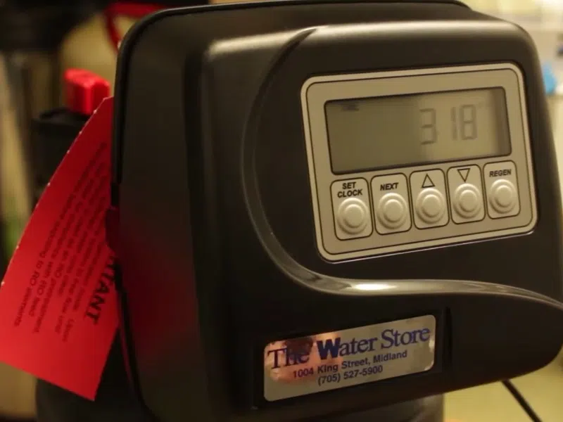 Whole-home water softener with control valve, brine tank, and plumbing connections for Faucet & Sink Repair in Goodyear showing whole water softener control valve brine tank connections faucet sink repair detail