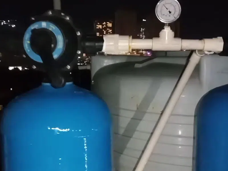 Whole-home water softener with control valve, brine tank, and plumbing connections for Faucet & Sink Repair in Goodyear