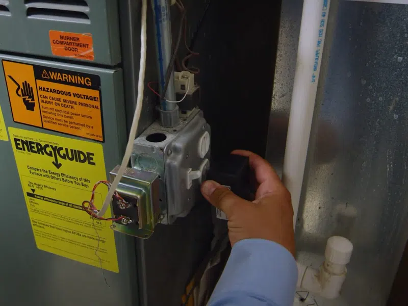 Whole-home water softener with control valve, brine tank, and plumbing connections for Water Softener Installation & Repair in Goodyear showing whole water softener control valve brine tank connections installation repair body detail